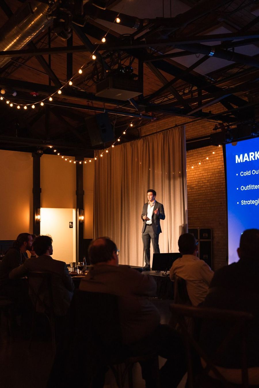 Carter pitching his first company on stage